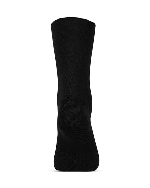 The menique men's merino lined sherpa socks in color black, in a white background, heel view.