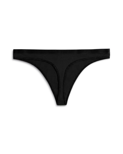 Back view of a women's merino wool thong in solid Black, showing the thong back construction and black elastic waistband.