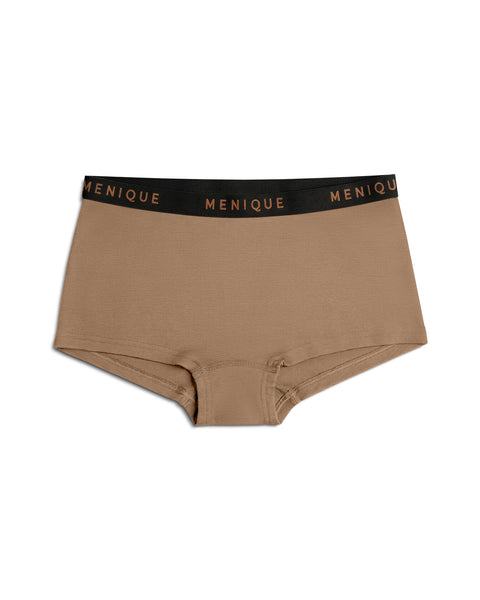 A product shot of beige women's boxer briefs laid flat against a plain white background. The underwear features a black elastic waistband with the brand name "MENIQUE" woven repeatedly in bronze lettering.