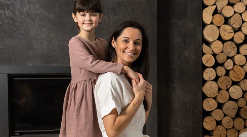 Mother's day gift ideas. Mother and daughter posing wearing Linen dresses