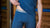 In the photo you can see the bottom part of man's body. He is wearing a blue top and boxer shorts made from natural 100% Merino wool.