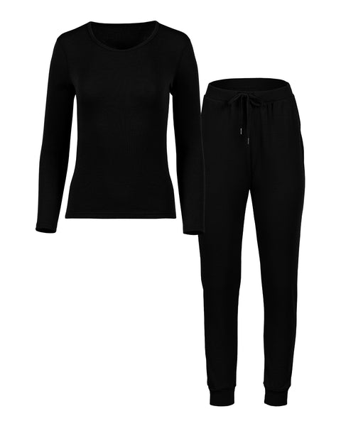 Packshot of women&#39;s long sleeve and joggers set in the color black