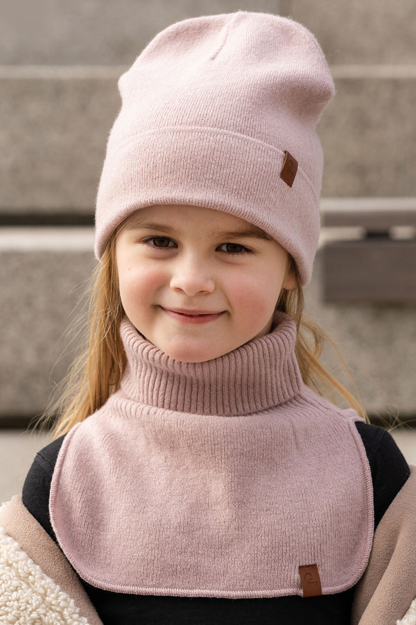 Child wearing dusty pink Merino wool knit dickie and beanie, soft thermal neck warmer for winter