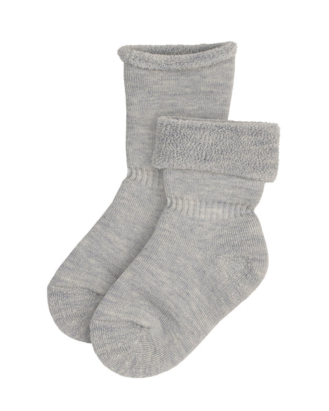 The menique KIDS&#39; Merino Sherpa Lined Socks in light gray color, one fully rolled up, and the other rolled down, revealing the sherpa lining.