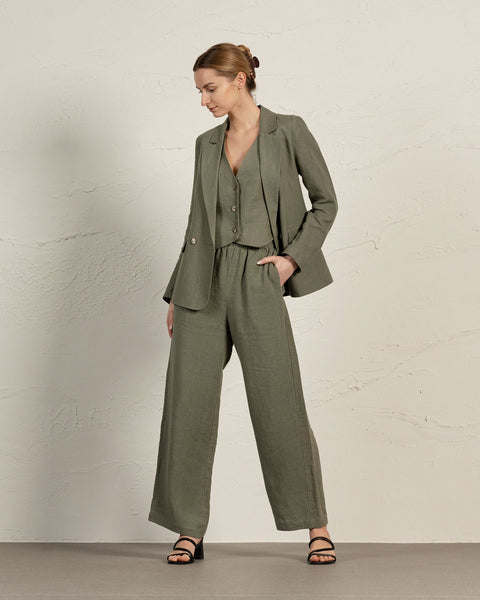 Elegant olive green linen blazer Quin with notch lapels and flap pockets, shown with matching wide-leg pants by menique
