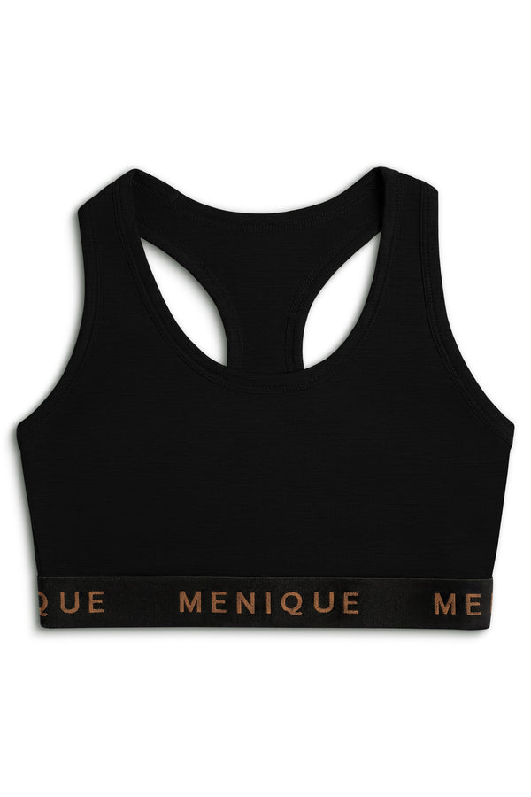 A product shot of a black racerback sports bra laid flat against a plain white background. The bra features a wide black elastic underbust band with the brand name "MENIQUE" printed across the front in bronze lettering.